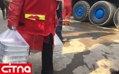 زیبا بروفه در محل حادثه پلاسکو غذا و سوهان توزیع کرد (+تصاویر)