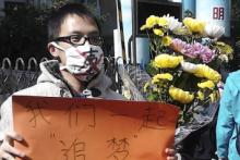 تجمع اعتراضی روزنامه&lrm;نگاران چینی&lrm; علیه سانسور رسانه&lrm;ها