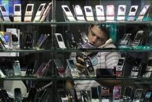 زورآزمایی 24 واردکننده مجاز آیفون با قاچاقچیان