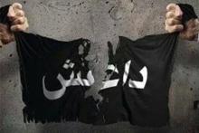 عکس تکان‌دهنده مدافع حرم بالای سر جنازه دختر‌ عراقی 