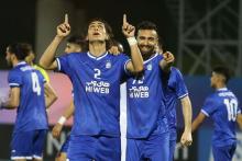 محمد نادری در کنار مزار مرحوم حجازی(+عکس)