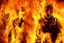 فرار از کشور مردی که برادر خود را به آتش کشید