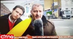 کتک خوردن تماشاچی مزاحم از خبرنگار در گزارش زنده (+فیلم)