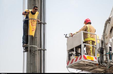 اقدام به خودکشی از بالای دکل مخابراتی در میدان هفت تیر (+عکس)