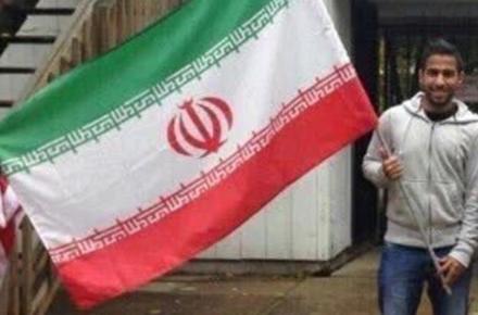 اهتزاز پرچم ایران در آمریکا توسط جوان سعودی (+تصویر) 