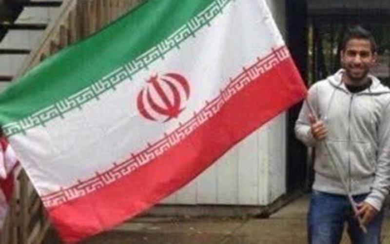 اهتزاز پرچم ایران در آمریکا توسط جوان سعودی (+تصویر) 
